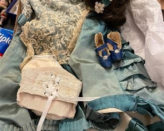 Antique Doll outfit complete with shoes and wig 