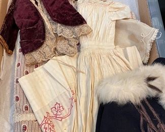 Lots of antique doll clothes