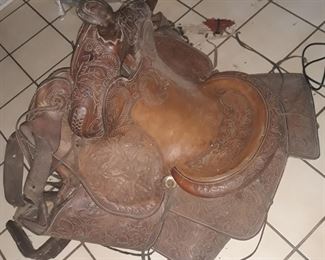 Tooled western saddle
Measures 15 inches
$150