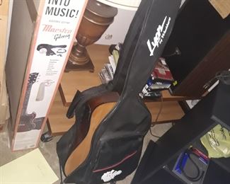 Washburn 
Lyon acoustic  guitar,  6 string 