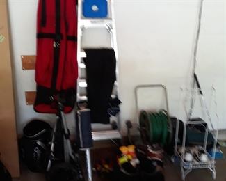 Golf supplies
Pull cart, shoes  size 11,  range balls and soft travel case