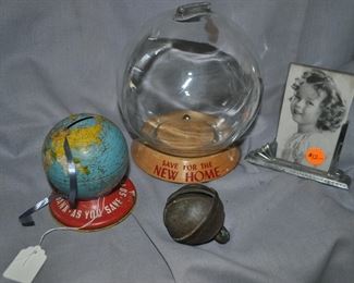 New Home bank, metal globe bank, sleigh bell and Shirley Temple picture in frame 