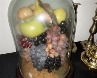 Antique wax fruit in a large antique cloche. 