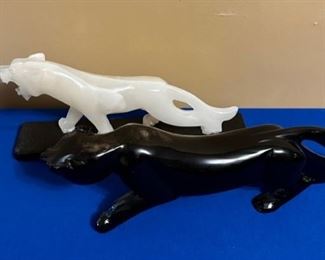 White alabaster and black obsidian panthers