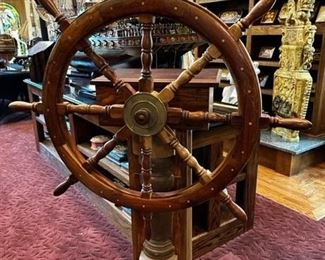 Ship wheel on stand