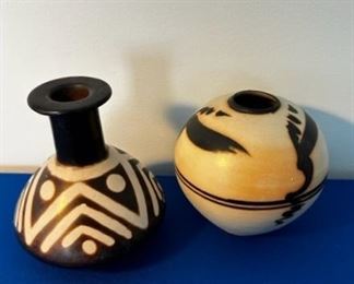 Many pieces of small signed pottery