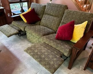 Ends of sofa recline, sofa is wallhugger reclining style. Measures approx. 87"wide x 38" deep x 40" high