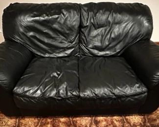 Natuzzi black leather loveseat