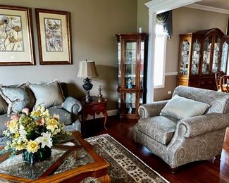 Living Room Furniture by Thomasville, Walter E. Smithe, Rug by Nourison,, Awesome Lamps, Lit Curio Cabinet, Cool framed Art and Drexel Heritage by Walter E. Smithe Club Chair