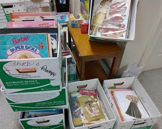Boxes and boxes of vintage modern and vintage paper dolls