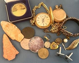 Coins, jewelry, arrowheads 