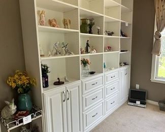 small figurines and vases and a small table