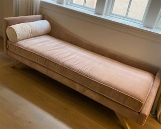 Precedent Chaise Lounge in blush velvet with a subtle cream and metallic roll pillow. $1,250. Legs are blond wood. Dimensions are 80"W x 29"D x 18"H.