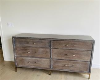 Vanguard 6 drawer dresser in brown wood with gray wash finish. $1,500. Legs are antiqued brass. Cabinet pulls are lucite with antique brass ends. Dimensions are 72"W x 22" D x 36"H