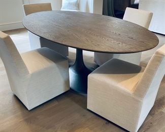 Restoration Hardware Aero Wood Oval Dining Table. $3,000. Top is Ash Grey Oak and base is Antiqued Pewter. Dimensions are 78"L x 48"W x 30"H. Chairs not available.