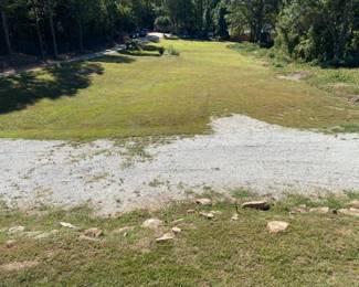 Parking in grass behind the house