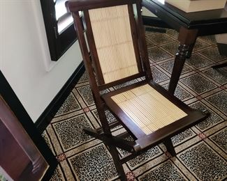 8 of these teak chairs that fold flat
