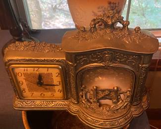 United Fireplace Motion Clock Lamp