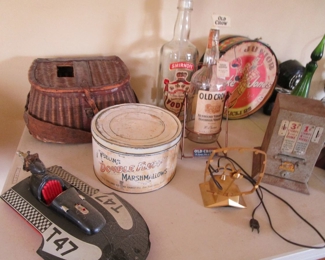 Table of treasures! Vintage tin, Coin op vintage, fishing creel and more