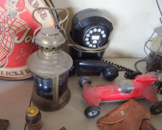 Antique phone, railroad lantern