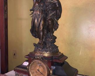 A French gilt and patinated Bronze clock by L. Gregoure