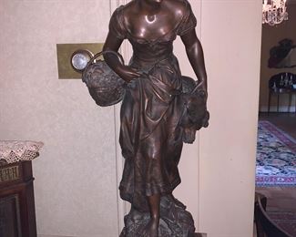 Bronze maiden sculpture
