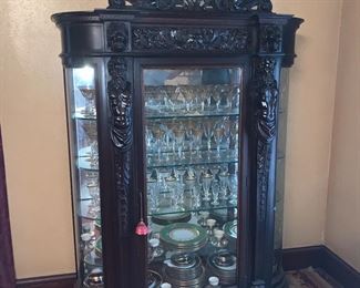 Victorian Renaissance Revival style carved and stained oak curio cabinet, late 19th century. 81 x 51 x 19"