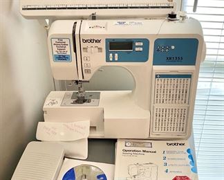 Brother Sewing Machine with attachments and case.