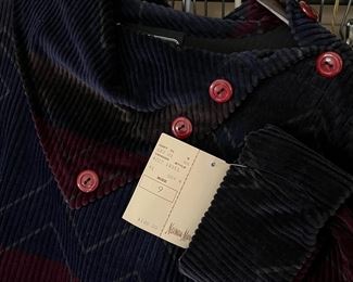 loads of vintage clothes, many still have tags on them from Neiman Marcus