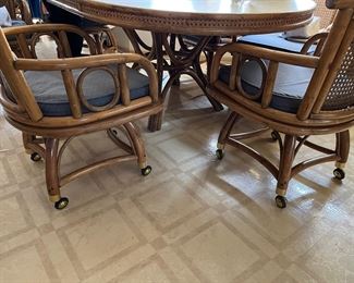 Vintage rattan kitchen set - cane & rattan swivel chairs on casters, Formica topped rattan table. 