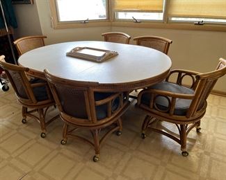 Vintage rattan kitchen set - cane & rattan swivel chairs on casters, Formica topped rattan table. 