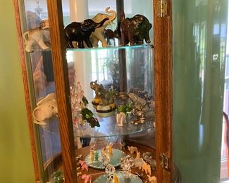 Tiny blown glass and crystal elephants.