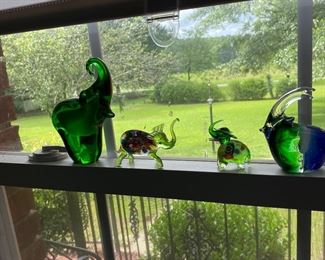 Over 100 Murano glass elephants!