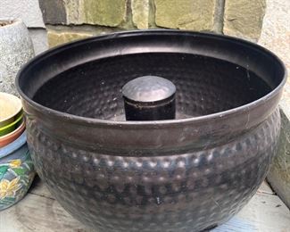 Hammered metal garden hose container 
