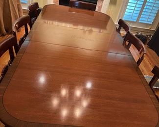 Quality Mahogany Table and 9 chairs ( maker unknown) 