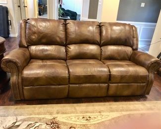 Luggage leather recliner sofa with nailhead trim