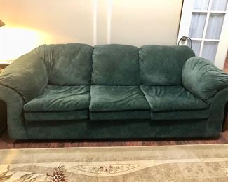 Hunter green fabric sofa