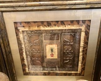 Pair of animal print matted embossed pictures