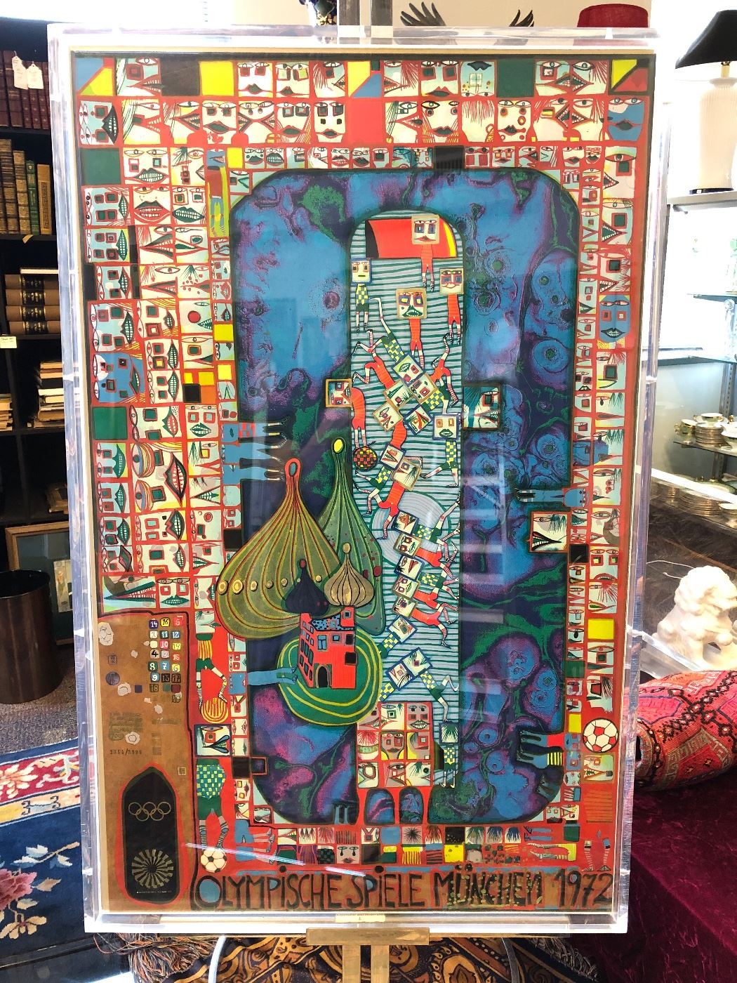 Hundertwasser official 1972 Olympics 27 color serigraph poster #2344/3999. Framed in lucite case.