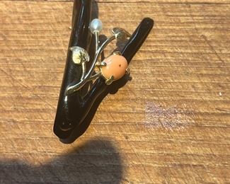 14k black coral and pink coral pin.