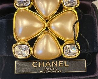 Large iconic Chanel pearl and crystal pin. 