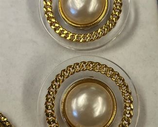 Lucite and pearl Chanel clips.