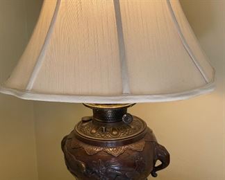 Antique Asian Metal Table Lamp with Elephant Motif. Photo 1 of 3.