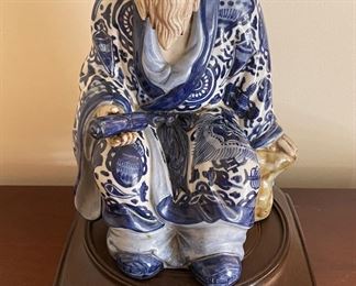 Vintage Porcelain Japanese Man on Stand. Measures 8" W x 12" H. Photo 1 of 2. 
