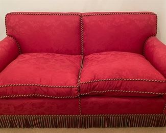 Red Damask Upholstered Down-Filled Sofa with Bouillon Fringe Trim. Measures 60" W x 35" D. Photo 1 of 5. 