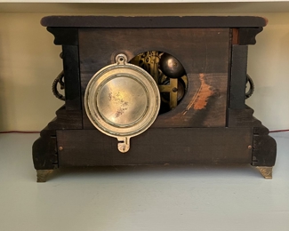 Antique Wood Mantle Clock with Brass Feet. Photo 2 of 3. 