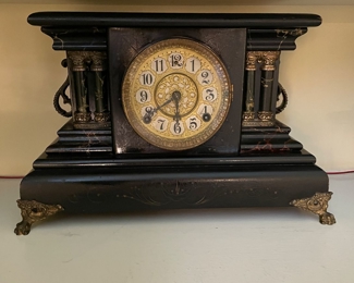 Antique Wood Mantle Clock with Brass Feet. Photo 1 of 3. 