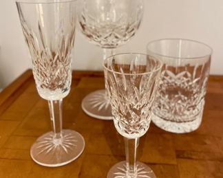 Waterford Lismore Crystal - Set of 8 Double Old Fashioned; Set of 12 Champagne Flutes; Set of 5
Cordials; Set of 10 Balloon Goblets; Set of 11 Water Goblets (not shown).
