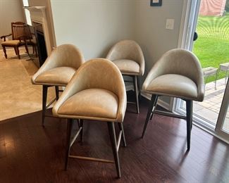 FOUR CREAM LEATHER STOOLS BY EASTWOOD FURNITURE