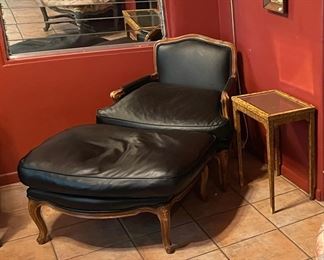 Faux leather chair with ottoman $600. Mirror and faux finished side table.